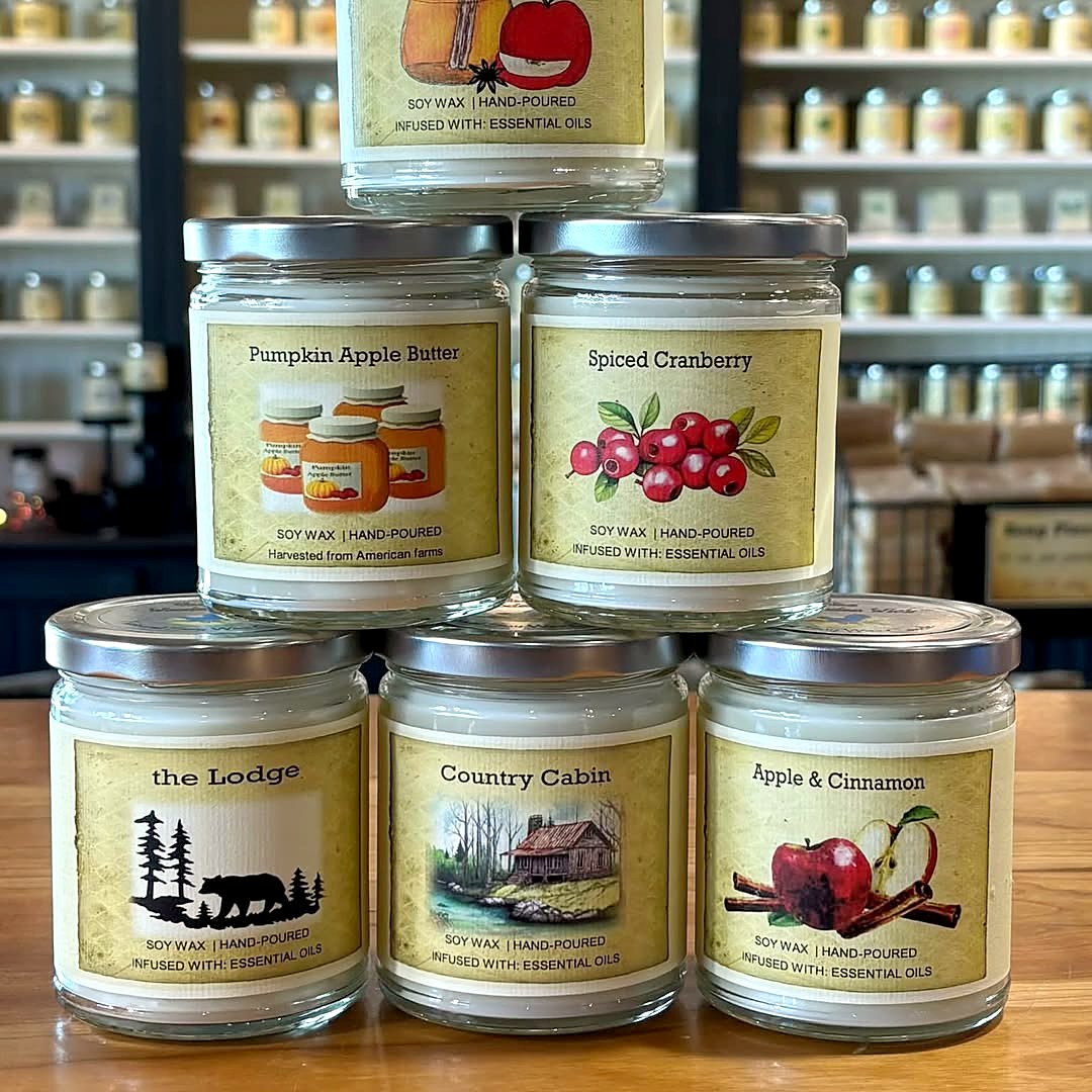 Fall Favorites Six-Pack: a 7 oz. Mulled Cider wood wick candle, a 7 oz. Pumpkin Apple Butter wood wick candle, a 7 oz. Spiced Cranberry wood wick candle, a 7 oz. The Lodge wood wick candle, a 7 oz. Country Cabin wood wick candle, a 7 oz. Apple & Cinnamon wood wick candle