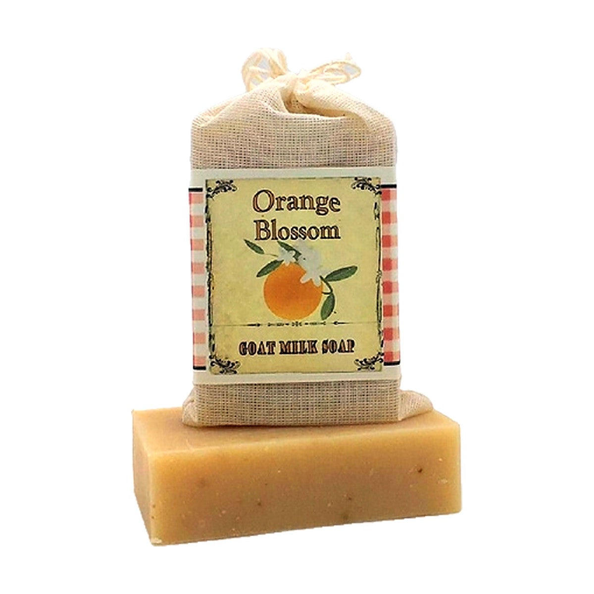 Orange Blossom Goat Milk Soap bar with labeled muslin soap bag