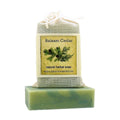 Balsam Cedar Herbal Soap bar with labeled muslin soap bag