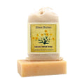 Shea Butter & Calendula Herbal Soap bar with labeled muslin soap bag