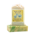 Snow on the Mountain Herbal Soap bar with labeled muslin soap bag