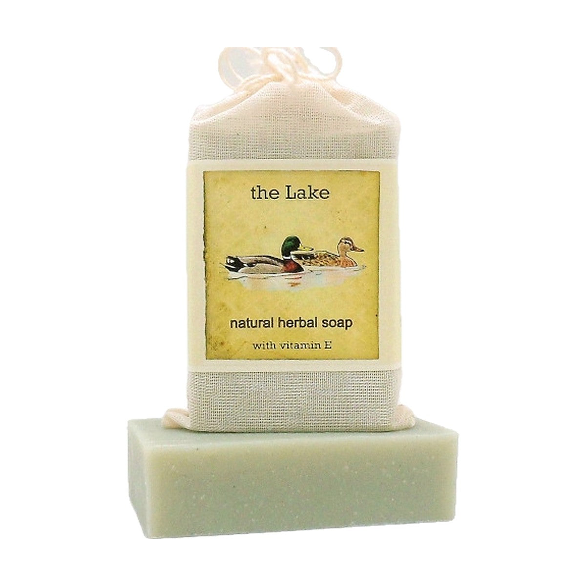 The Lake Herbal Soap bar with labeled muslin soap bag